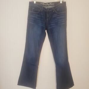 Juicy Couture The Cali Heart pocket bootcut Jeans. Size  31×30